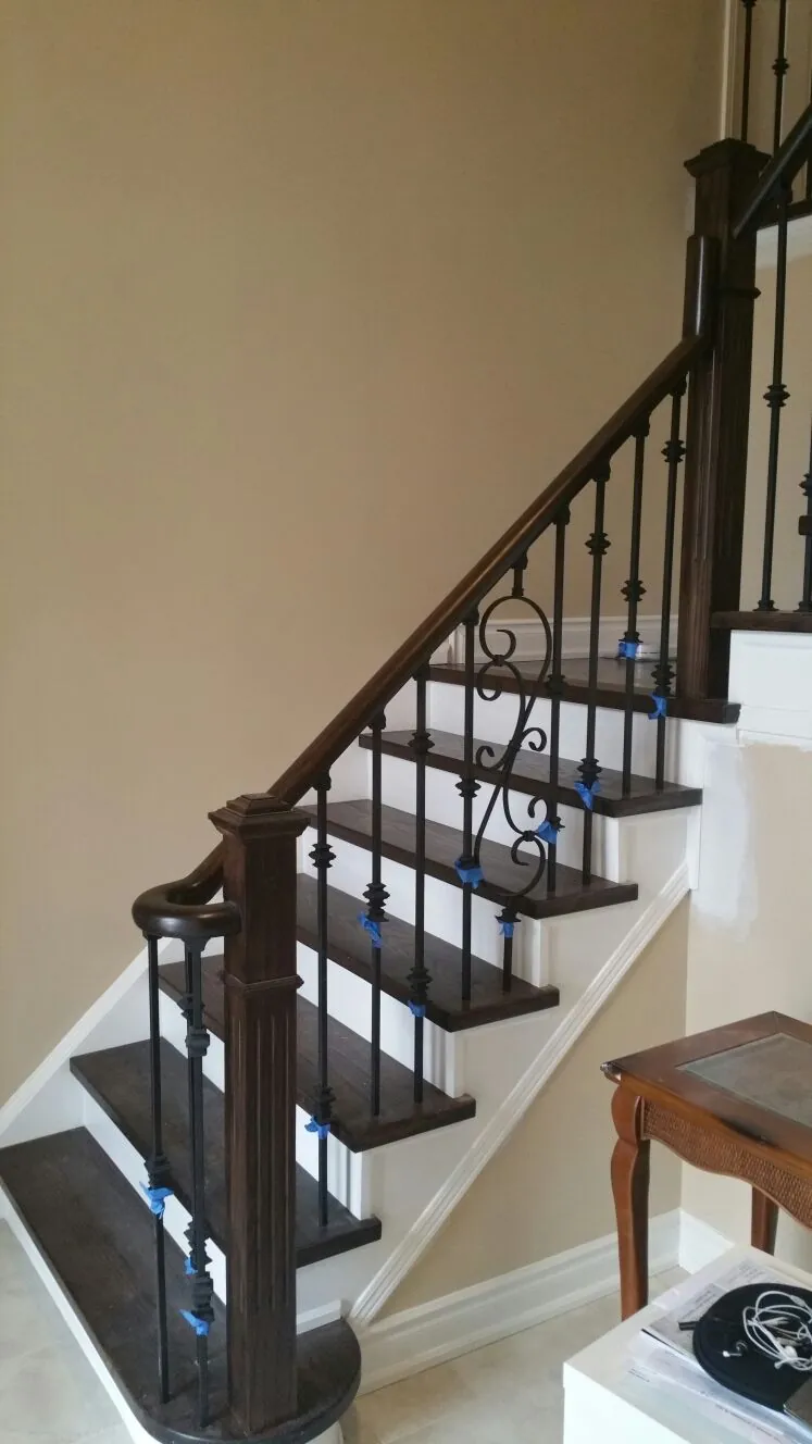 Refinished Hardwood Staircase with White Risers